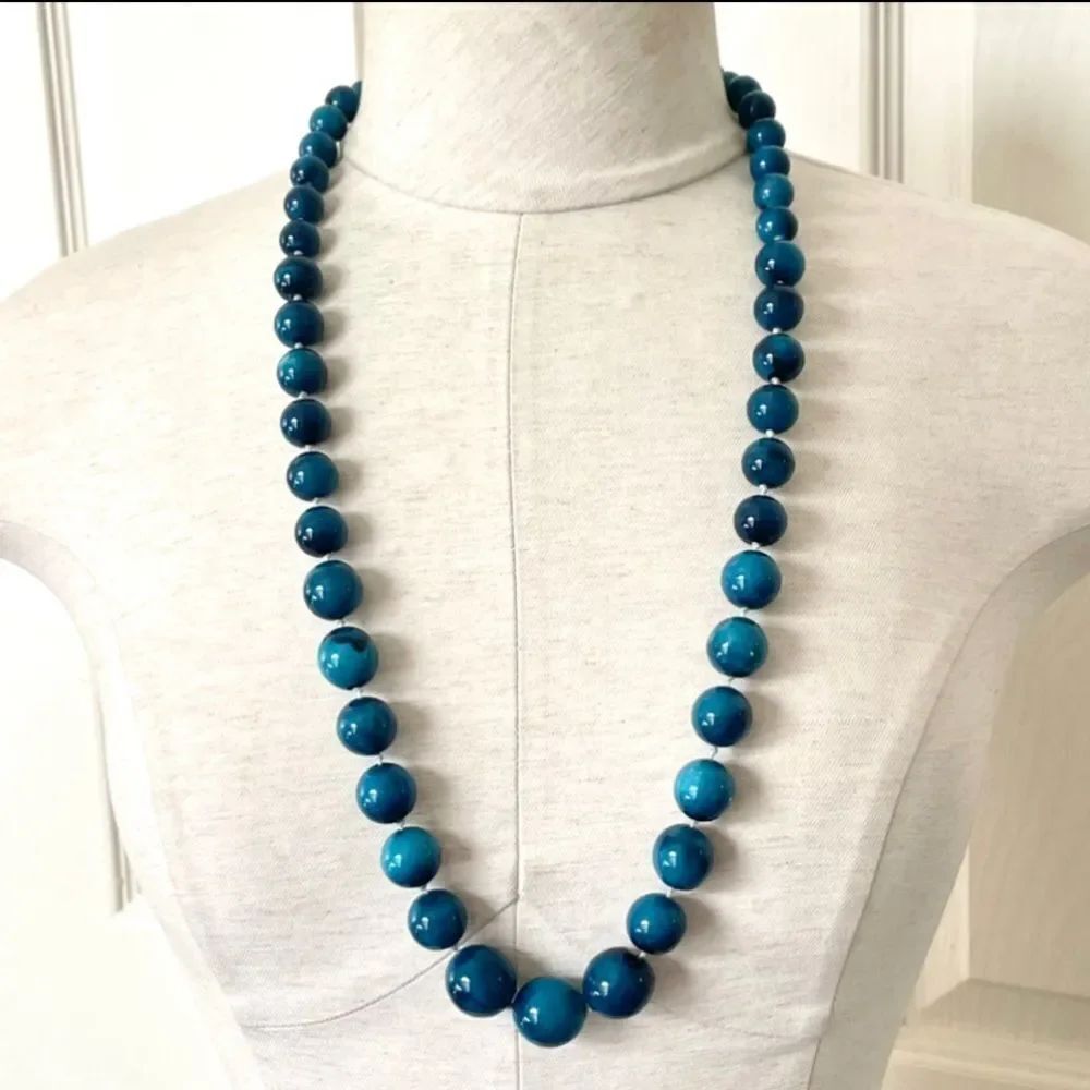 Long blue beaded necklace